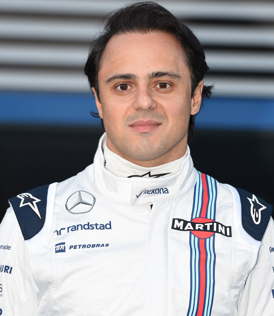 Felipe Massa poses for the cameras in his 2015 overalls Felipe Massa poses for the cameras in his 2015 overalls
